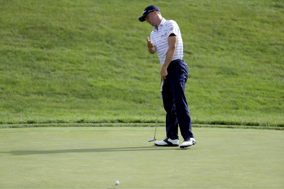 Justin Thomas reacts to missing his birdie putt on the 18th green during the third round of the Workday Charity Open golf tournament, Saturday, July 11, 2020, in Dublin, Ohio. (AP Photo/Darron Cummings)