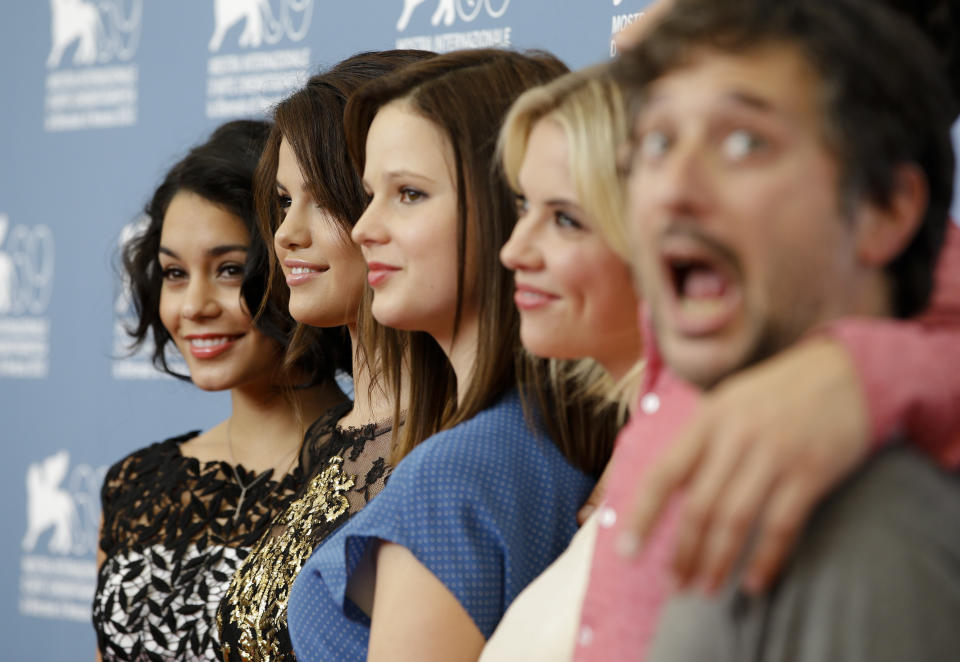 From left, actors Vanessa Hudgens, Selena Gomez, Rachel Korine, Ashley Benson and director Harmony Korine pose at the photo call for the film 'Spring Breakers' at the 69th edition of the Venice Film Festival in Venice, Italy, Wednesday, Sept. 5, 2012. (AP Photo/Andrew Medichini)