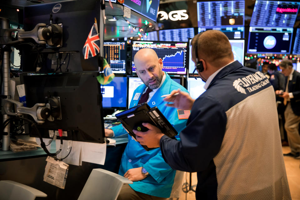 Traders work on the floor of the New York Stock Exchange (NYSE) in New York, U.S., on Monday, Dec. 3, 2018. Photographer: Michael Nagle/Bloomberg via Getty Images