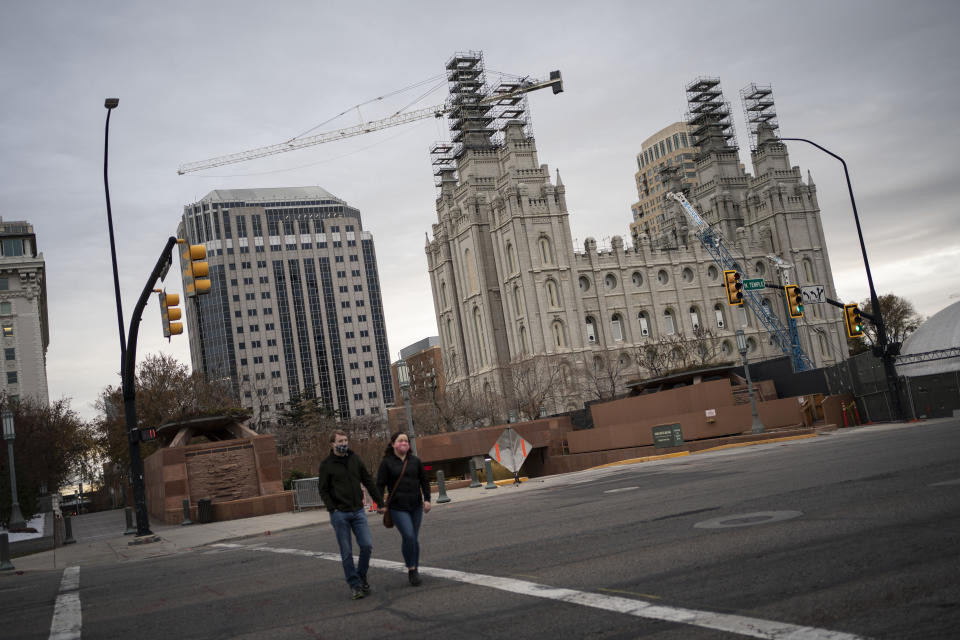 The Salt Lake Temple of The Church of Jesus Christ of Latter-day Saints is seen under construction in Salt Lake City, Sunday, Nov. 15, 2020. While the church has traditionally been overwhelmingly conservative and Republican, today there's also an increasingly large strain of liberal members. The church has also begun to directly address its history of racism, including a ban on Black priests that it lifted four decades ago. (AP Photo/Wong Maye-E)