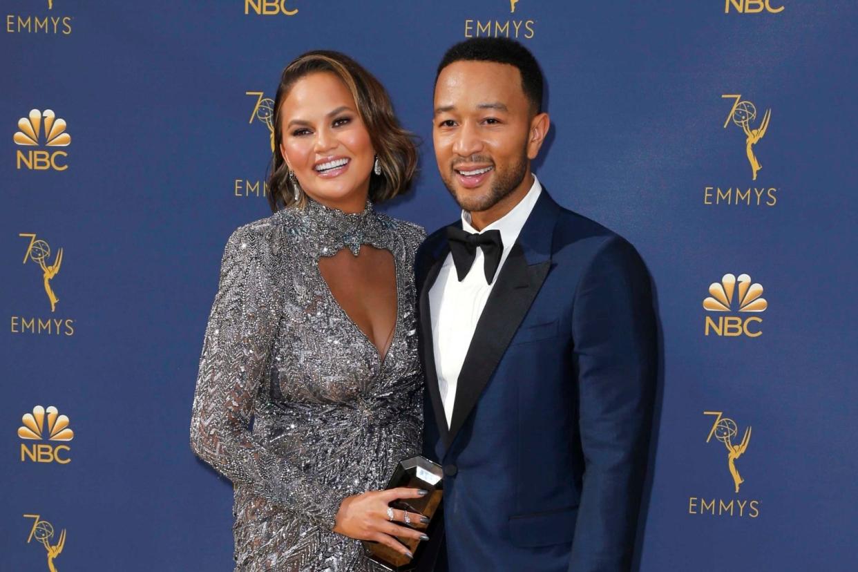 Unimpressed: Chrissy Teigen with her husband John Legend: Reuters