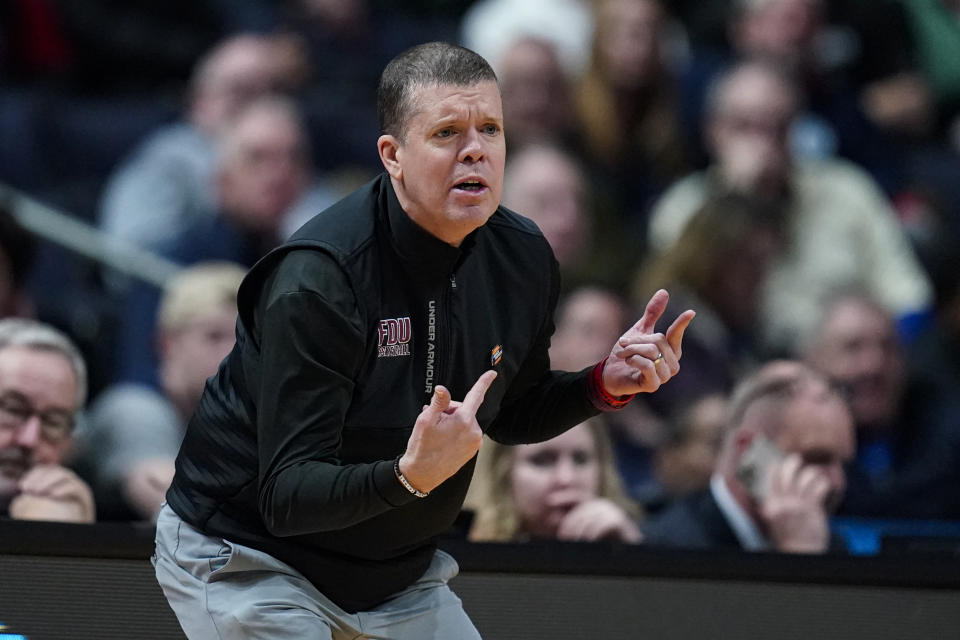 Fairleigh Dickinson head coach Tobin Anderson gestures in the first half of a second-round college basketball game against Florida Atlantic in the men's NCAA Tournament in Columbus, Ohio, Sunday, March 19, 2023. (AP Photo/Michael Conroy)