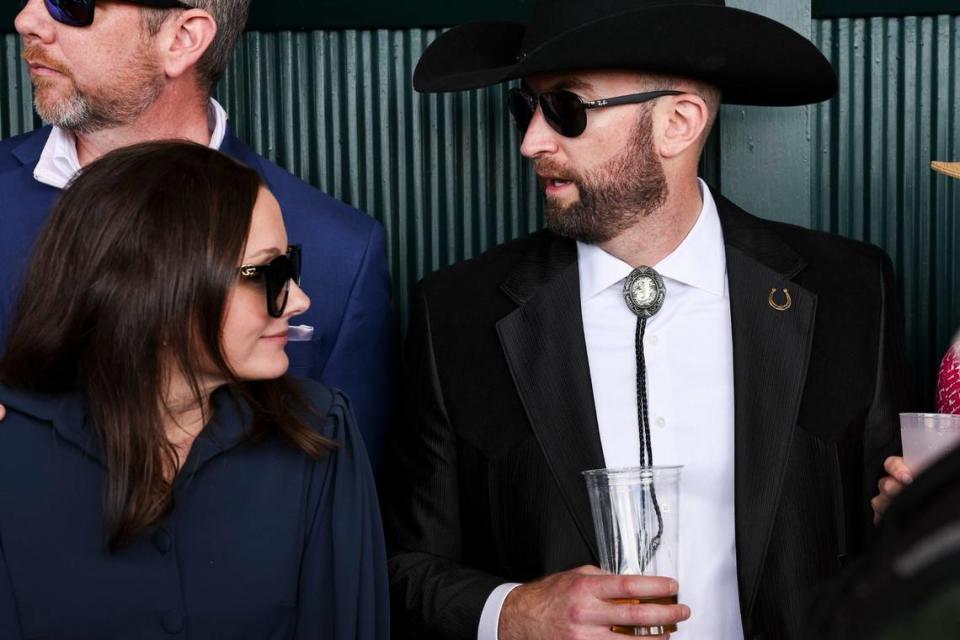 Patrons mingle and enjoy beverages in the grandstand during Blue Grass Stakes Day at Keeneland on April 6. All-sources wagering during the Spring Meet was the third-highest in Keeneland history. Silas Walker/swalker@herald-leader.com