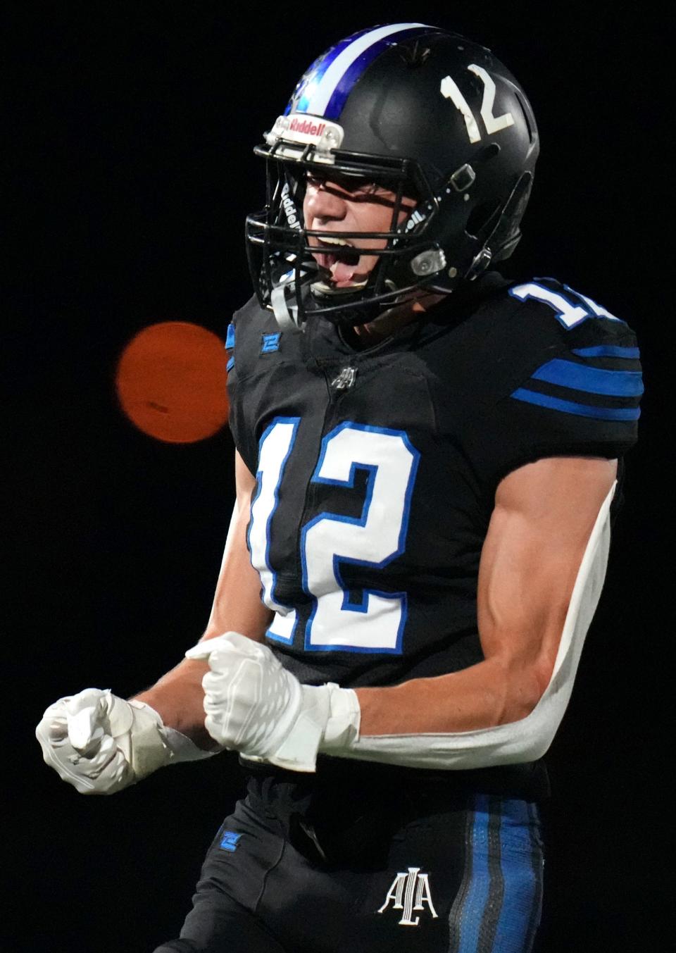 American Leadership Academy Gilbert North safety Tyton Slade (12) celebrates his sack against Arizona College Prep on Friday, Oct. 21. 2022. 