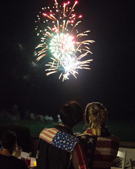 They also cuddled during the fireworks display while rocking coordinating American flag apparel. (Photo: Instagram)