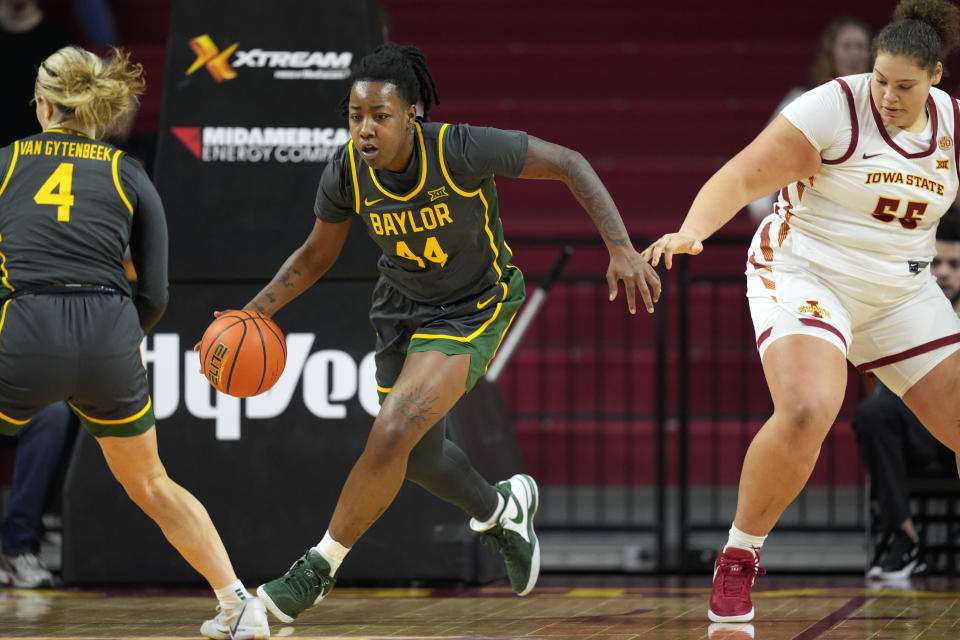 Baylor forward Dre'Una Edwards (44) drives up court after stealing the ball from Iowa State center Audi Crooks (55) during the first half of an NCAA college basketball game, Saturday, Jan. 13, 2024, in Ames, Iowa. (AP Photo/Charlie Neibergall)