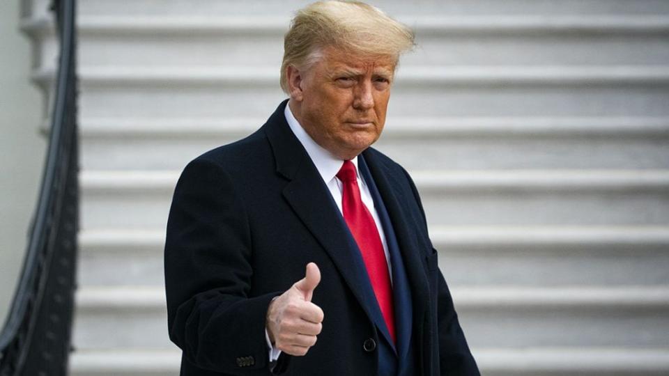 U.S. President Donald Trump gives a thumbs up as he departs on the South Lawn of the White House, on December 12, 2020 in Washington, DC. (Photo by Al Drago/Getty Images)
