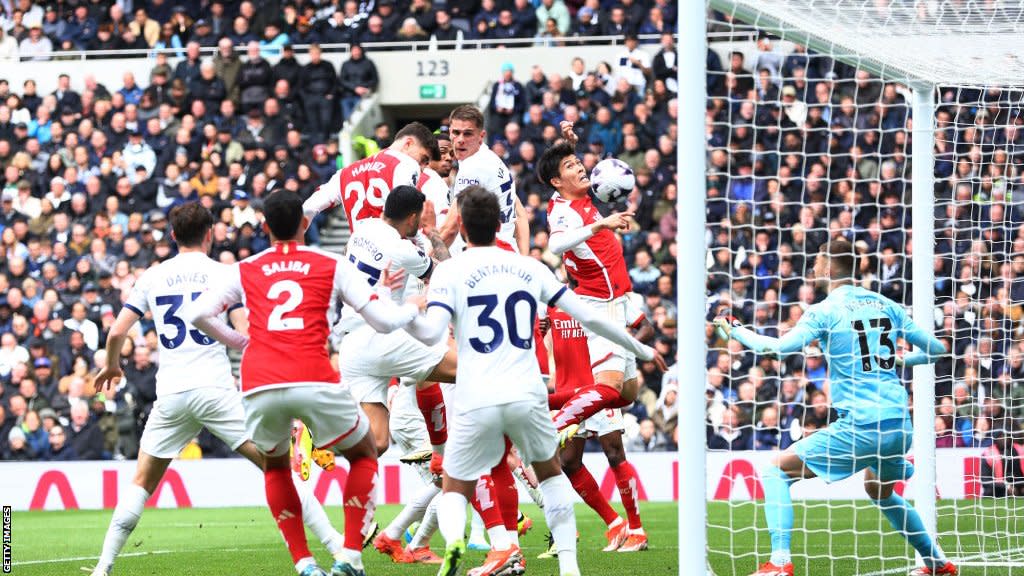 Tottenham 23 Arsenal Gunners survive Spurs fightback to go four