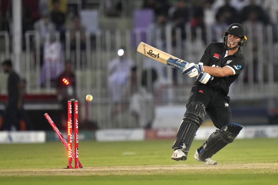 New Zealand's Mark Chapman is bowled out by Pakistan's Haris Rauf during the first one-day international cricket match between Pakistan and New Zealand, in Rawalpindi, Pakistan, Thursday, April 27, 2023. (AP Photo/Anjum Naveed)