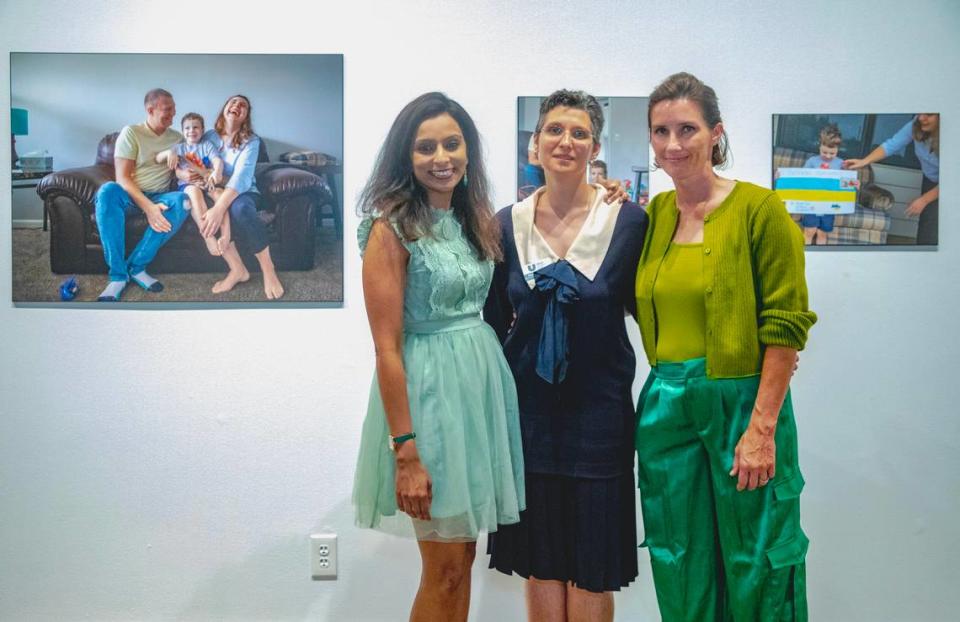 Left to right: “Where We Belong: Refugee Stories from Wichita” exhiition co-curators Mytheli Menon and Ksenya Gurshtein and photographer Kendra Cremin