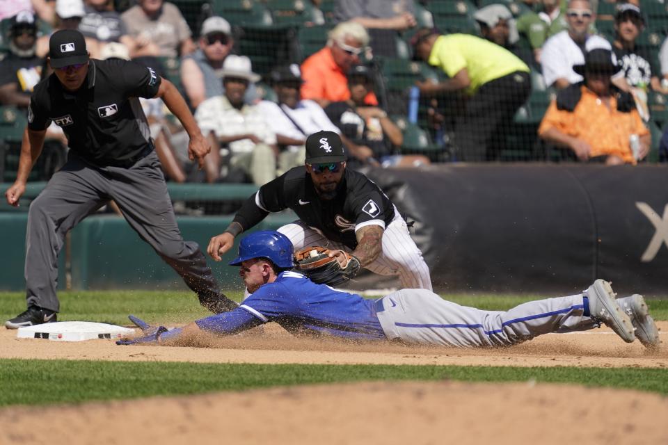 Umpire Roberto Ortiz looks on as Chicago White Sox third baseman Leury Garcia tags out Kansas City Royals' Drew Waters who was trying to advance on a fielders choice by Nicky Lopez in the fifth inning of a baseball game in Chicago, Thursday, Sept. 1, 2022. Lopez was safe at first on the play. (AP Photo/Nam Y. Huh)