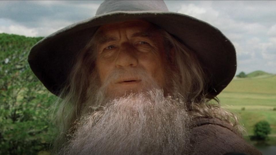Gandlaf looking at Bilbo in Fellowship of the Ring
