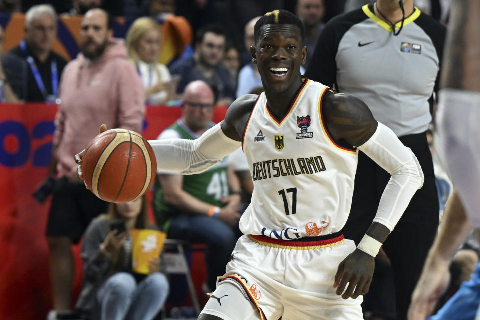 Germany's Dennis Schroder in action during the Eurobasket preliminary round Group B match between Germany and Slovenia in Cologne, Germany, Tuesday, Sept. 6, 2022. (Federico Gambarini/dpa via AP)