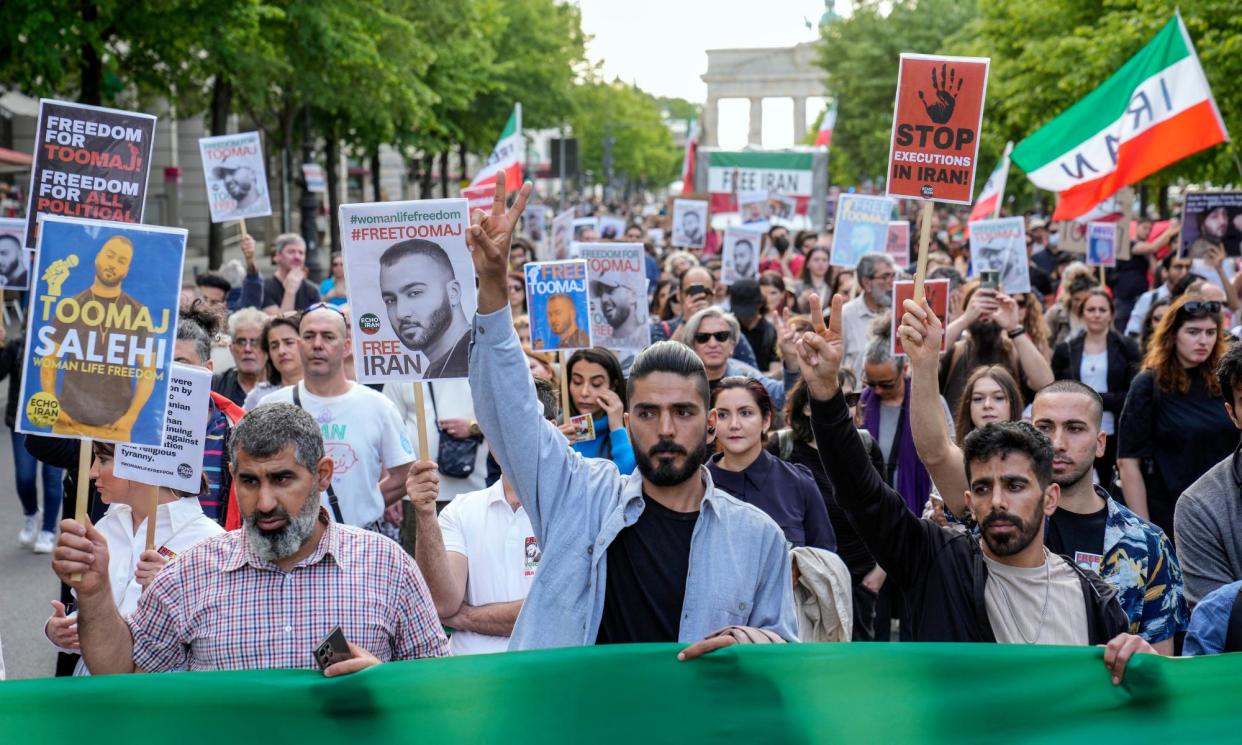 <span>A rally in Berlin on 28 April protesting against the death sentence given to Toomaj Salehi.</span><span>Photograph: Ebrahim Noroozi/AP</span>