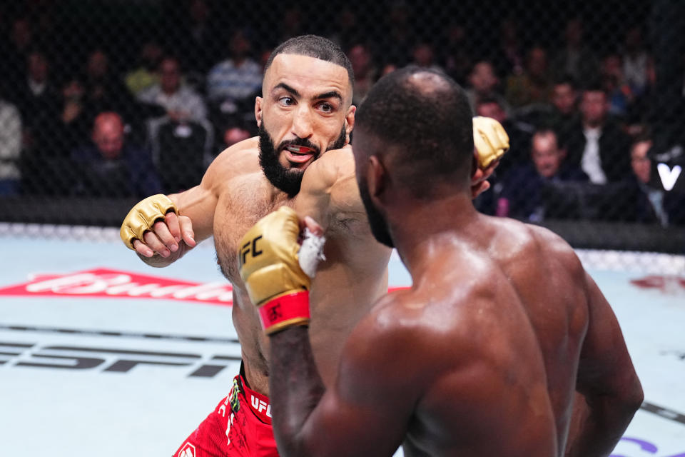 MANCHESTER, UNITED KINGDOM – JULY 27: (From left) Belal Muhammad punches down Leon Edwards of Jamaica in their UFC welterweight championship bout during the UFC 304 event at Co-op Live in Manchester, United Kingdom on July 27, 2024. (Photo by Chris Unger/Zuffa LLC via Getty Images)