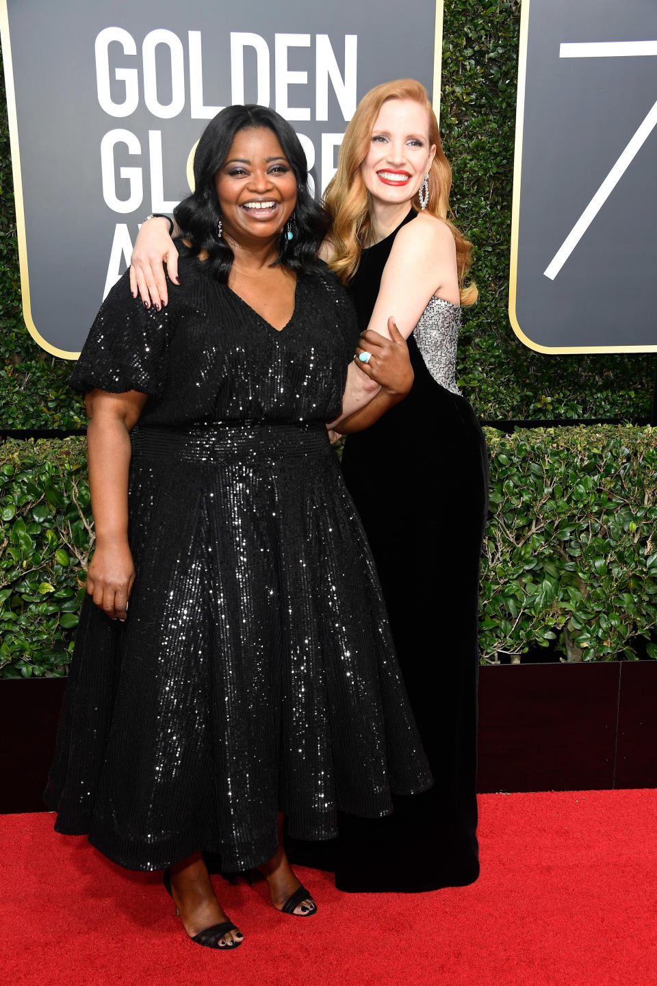 jessica and octavia hugging on the red carpet