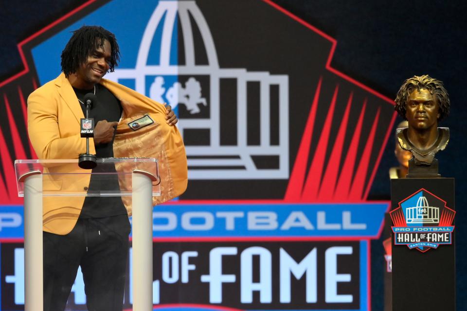 Edgerrin James speaks during the enshrinement at the Pro Football Hall of Fame on Saturday.