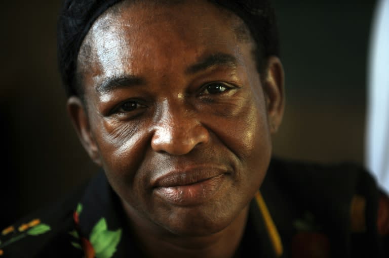 Rose Hyppolite, 52, poses for a picture at a school in Fond Parisien, Haiti, where she has been staying after being deported from the Dominican Republic on June 27