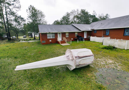 Bethlehem Missionary Baptist Church's steeple lies on the ground next to the church after Hurricane Florence struck in Winnabow, North Carolina, U.S., September 15, 2018. REUTERS/Jonathan Drake