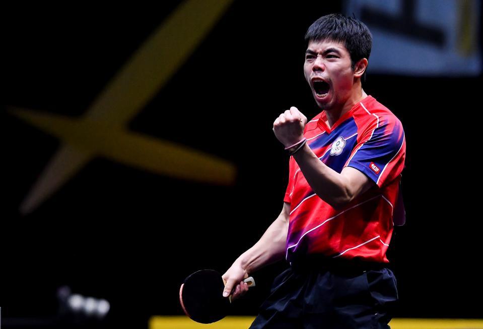 Chuang Chih-Yuan of Chinese Taipei reacts against Lee Sangsu of South Korea during the men's team final between South Korea and Chinese Taipei at the 2021 ITTF-ATTU Asian Championships Doha in Doha, Qatar, Oct. 1, 2021. (Photo by Nikku/Xinhua via Getty Images)