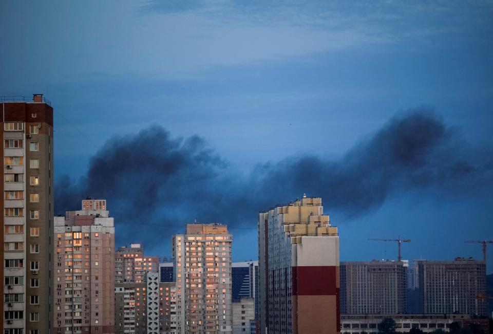 Smoke rises after a Russian missile strike in Kyiv (REUTERS)