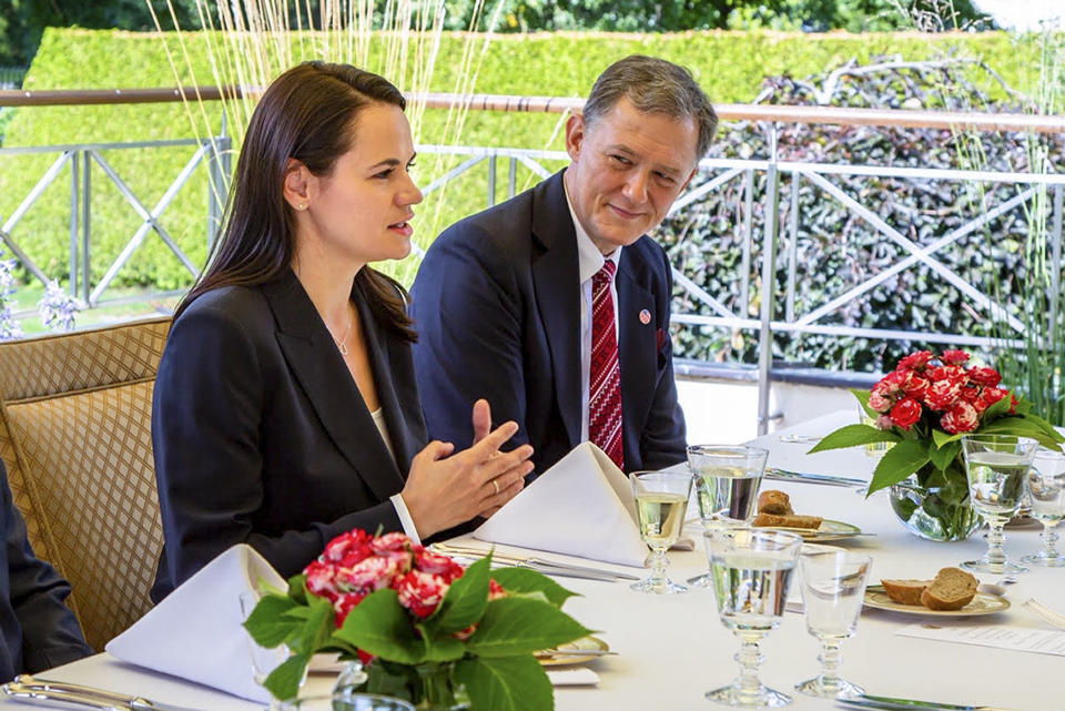 In this photo provided by the Sviatlana Tsikhanouskaya campaign office, Sviatlana Tsikhanouskaya, former candidate for the presidential elections, speaks to U.S. Deputy Secretary of State Stephen Biegun during their meeting in Vilnius, Lithuania, Monday, Aug. 24, 2020. (Sviatlana Tsikhanouskaya campaign office vis AP)