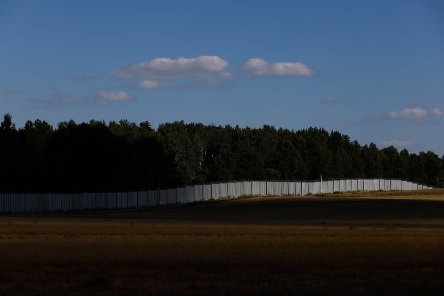 A metal wall on the border between Poland and Belarus, in Jurowlany, Poland, Saturday, Aug. 12, 2023. (AP Photo/Michal Dyjuk)