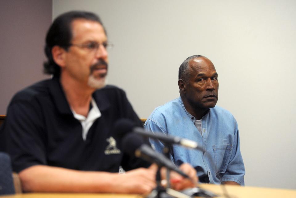 <p>O.J. Simpson reacts during the testimony of Bruce Forming during his parole hearing at Lovelock Correctional Center July 20, 2017 in Lovelock, Nevada. Simpson is serving a nine to 33 year prison term for a 2007 armed robbery and kidnapping conviction. (Photo by Jason Bean-Pool/Getty Images) </p>