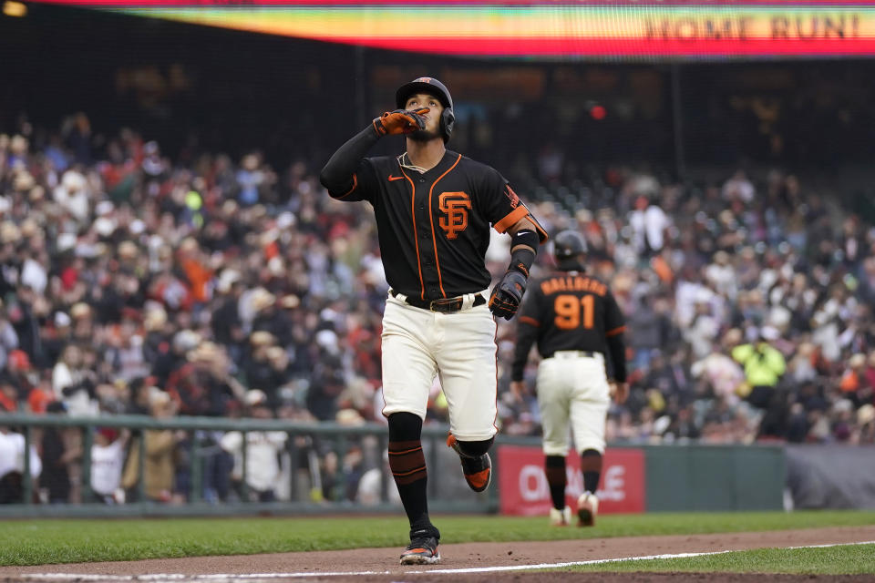 San Francisco Giants' Thairo Estrada gestures after hitting a two-run home run against the Milwaukee Brewers during the third inning of a baseball game in San Francisco, Saturday, May 6, 2023. (AP Photo/Jeff Chiu)