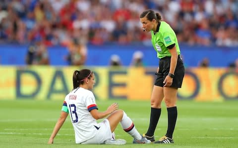 Referee Maryna Striletska talks to Alex Morgan of the USA during the 2019 FIFA Women's World Cup France Quarter Final match between France and USA  - Credit: GETTY IMAGES