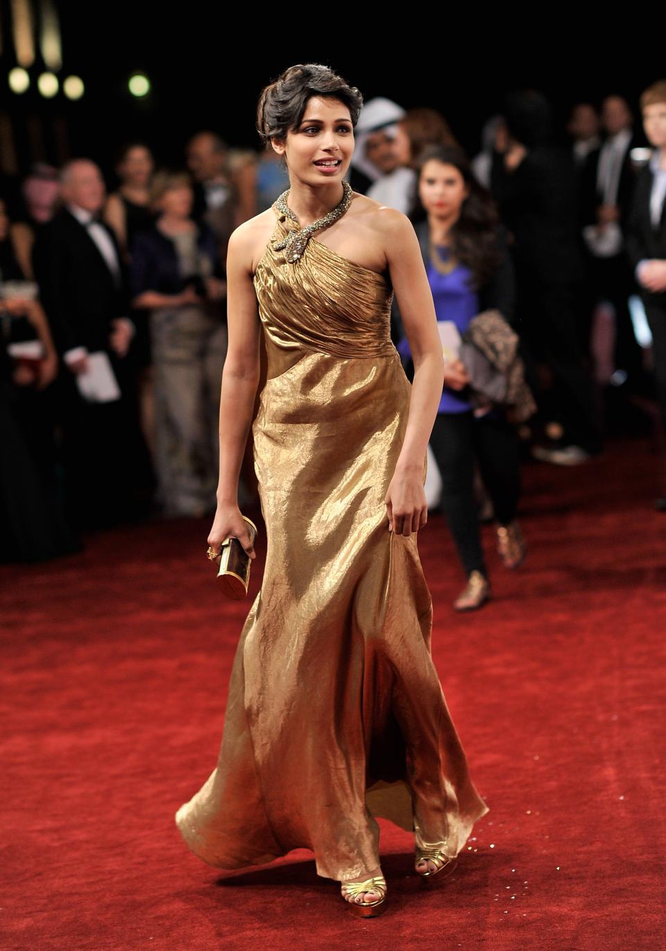 DUBAI, UNITED ARAB EMIRATES - DECEMBER 09: Actress Freida Pinto attends the "Life of PI" Opening Gala during day one of the 9th Annual Dubai International Film Festival held at the Madinat Jumeriah Complex on December 9, 2012 in Dubai, United Arab Emirates. (Photo by Gareth Cattermole/Getty Images for DIFF)