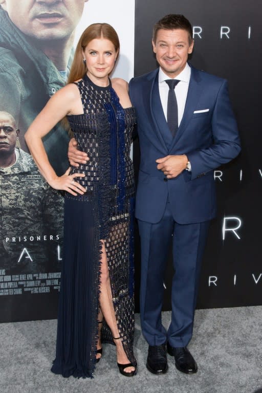 Amy Adams (L) and Jeremy Renner arrive for the premiere of "Arrival" in November 2016 in Westwood, California