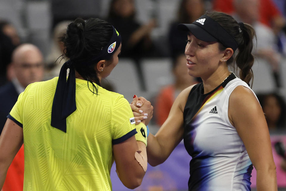 Ons Jabeur of Tunisia, left, greets Jessica Pegula after winning the match during round robin-play on day three of the WTA Finals tennis tournament in Fort Worth, Texas, Wednesday, Nov. 2, 2022. Jabeur won 1-6, 6-3, 6-3. (AP Photo/Tim Heitman)