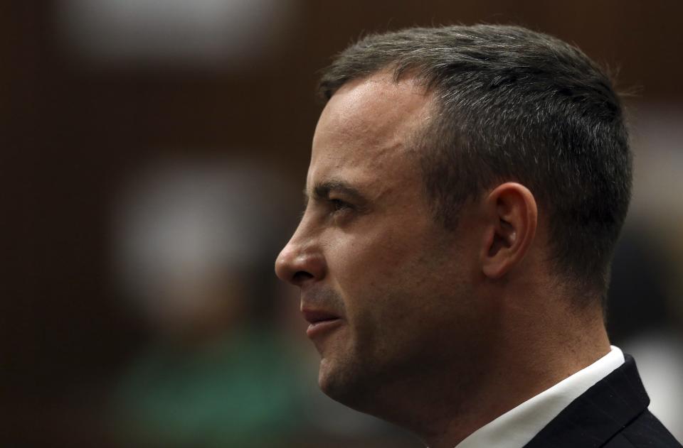 South African Olympic and Paralympic athlete Pistorius sits in the dock during his murder trial in the North Gauteng High Court in Pretoria