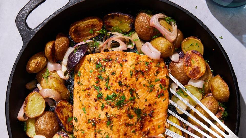 baked salmon potato skillet with shallots and dill yogurt sauce