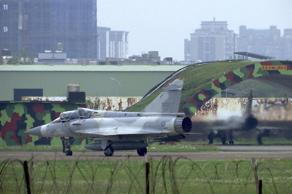 In this image made from video, a mirage fighter jet prepares to take off at an Air base in Hsinchu, Taiwan, Thursday, April 6, 2023. Taiwan's Ministry of National Defense said Wednesday evening it had tracked China's Shandong aircraft carrier passing southeast of Taiwan through the Bashi Strait. On Thursday morning, it tracked three People's Liberation Army navy vessels and one warplane in the area around the island. (AP Photo/Johnson Lai)