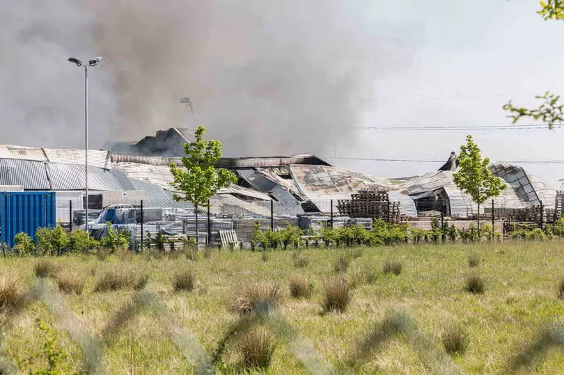 A huge fire consumes an industrial unit off Blakeney Way in Cannock. A large fire service response was sent to the huge warehouse blaze shortly after 6am on Thursday, May 9 -Credit:Birmingham Live