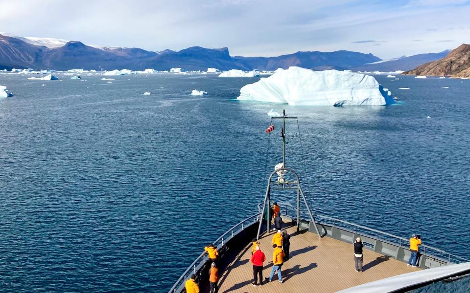 The Seabourn Venture sails through the waters around Greenland's coast