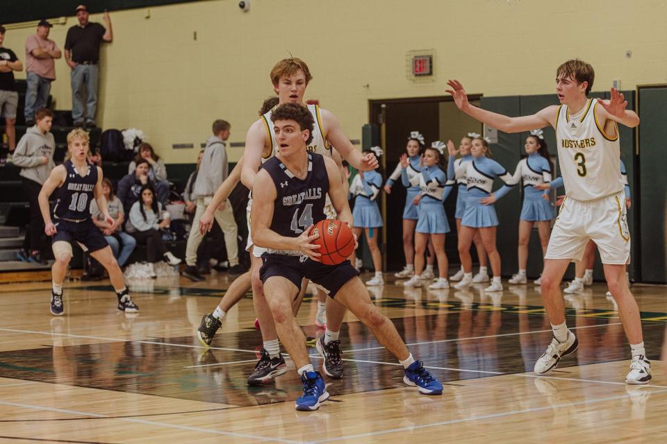 Great Falls High's Mason Kralj looks to pass against CMR Friday night at CMR Fieldhouse.