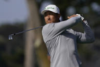 Li Haotong of China, hits from the fairway on the 10th hole during the second round of the PGA Championship golf tournament at TPC Harding Park Friday, Aug. 7, 2020, in San Francisco. (AP Photo/Charlie Riedel)