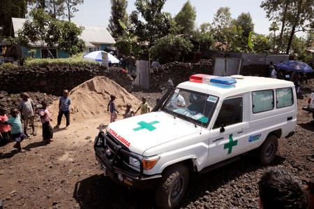 FILE PHOTO: An ambulance waits next to a health clinic to transport a suspected Ebola patient in Goma