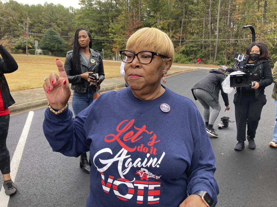 Helen Butler, executive director of The Georgia Coalition for the People's Agenda, speaks to organizers at a Black church tradition event known as "Souls to the Polls," in Decatur, Ga., Sunday, Oct. 30, 2022. (AP Photo/Sudhin Thanawala)