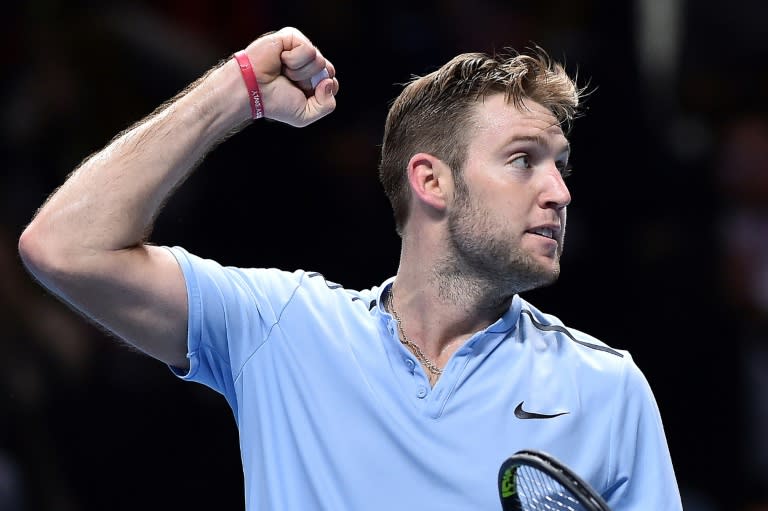 USA's Jack Sock reacts after beating against Croatia's Marin Cilic on November 14, 2017