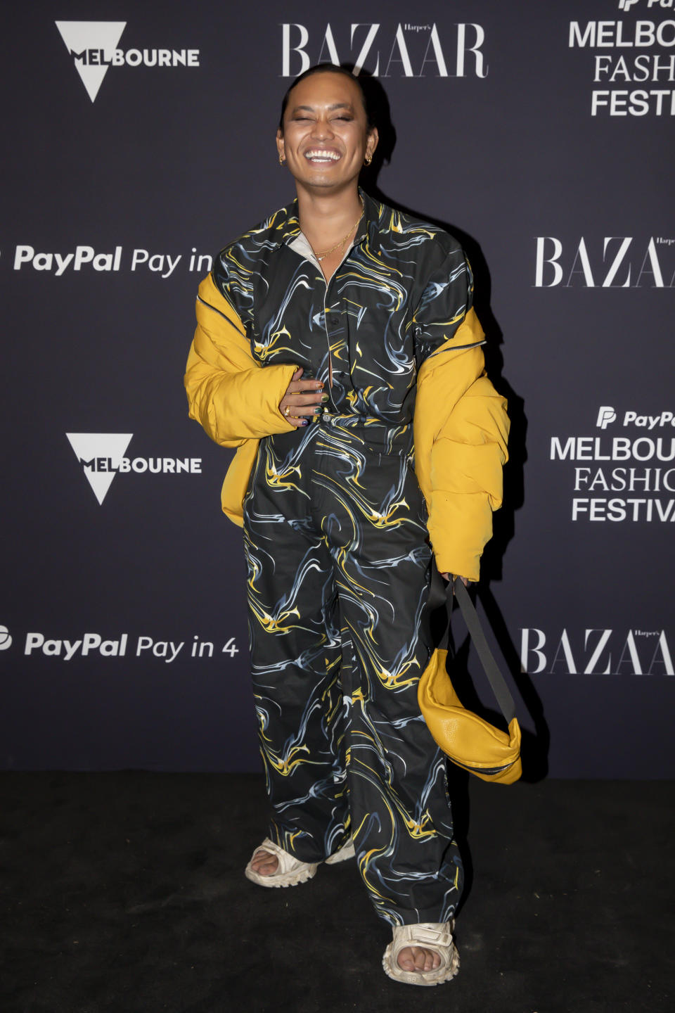 masterchef Khanh Ong arrives at the Melbourne Fashion Festival Closing Runway