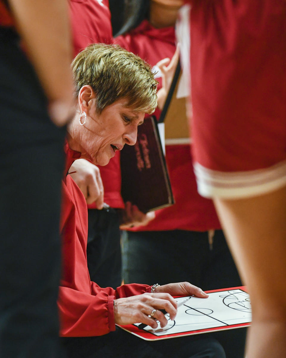 Indiana head coach Teri Moren talks with her team during a time out against Minnesota in the first half of an NCAA college basketball game on Wednesday, Feb 1, 2023, in Minneapolis. Indiana won 77-54. (AP Photo/Craig Lassig)