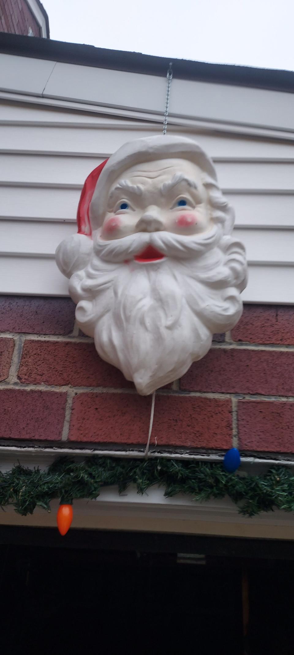 Santa oversees the Melfis' decorated yard in Ellwood City.