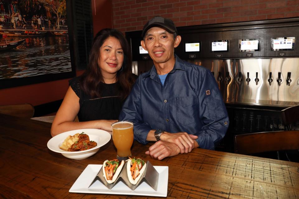 Fay Nham and her chef husband Tai Nham, owners of Mekong District One, the new self-pour taproom that's now part of the Vietnamese restaurant Mekong District in Nyack Aug. 25, 2023.