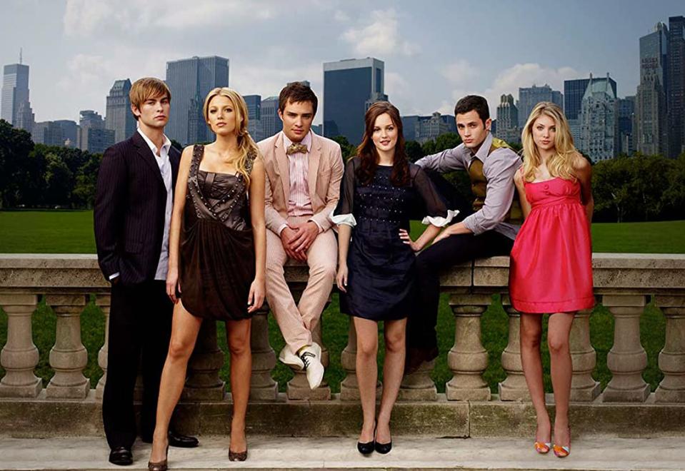 A press clip from Gossip Girl shows the cast sitting on a fancy wall