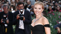 <p>When she was just 9, Scarlett Johansson appeared in the off-Broadway play “Sophistry,” starring Ethan Hawke and Calista Flockhart. She got her big break at 13 when she starred in “The Horse Whisperer.” She’s become one of Hollywood’s top leading ladies, with starring roles in hits such as “Lost in Translation,” “Her” and “The Avengers” franchise.</p> <p>In 2019, the talented actress was nominated for Oscars in two different categories — best actress for “Marriage Story” and best supporting actress for “Jojo Rabbit.” She's headlining the latest in the Marvel Cinematic Universe, "Black Widow," out now, for which she will earn more than $15 million.</p> <p>Johansson has been engaged to “Saturday Night Live” star Colin Jost since 2019. She previously was married to French art collector Romain Dauriac from 2014-17 and actor Ryan Reynolds from 2008-10. She quietly married SNL host Colin Jost in October, 2020.</p> <p><a href="https://www.gobankingrates.com/net-worth/celebrities/how-much-is-scarlett-johansson-worth/?utm_campaign=1128534&utm_source=yahoo.com&utm_content=15&utm_medium=rss" rel="nofollow noopener" target="_blank" data-ylk="slk:Read on to learn more about Scarlett Johansson's work and wealth.;elm:context_link;itc:0;sec:content-canvas" class="link ">Read on to learn more about Scarlett Johansson's work and wealth. </a></p> <p><small>Image Credits: Andrea Raffin / Shutterstock.com</small></p>