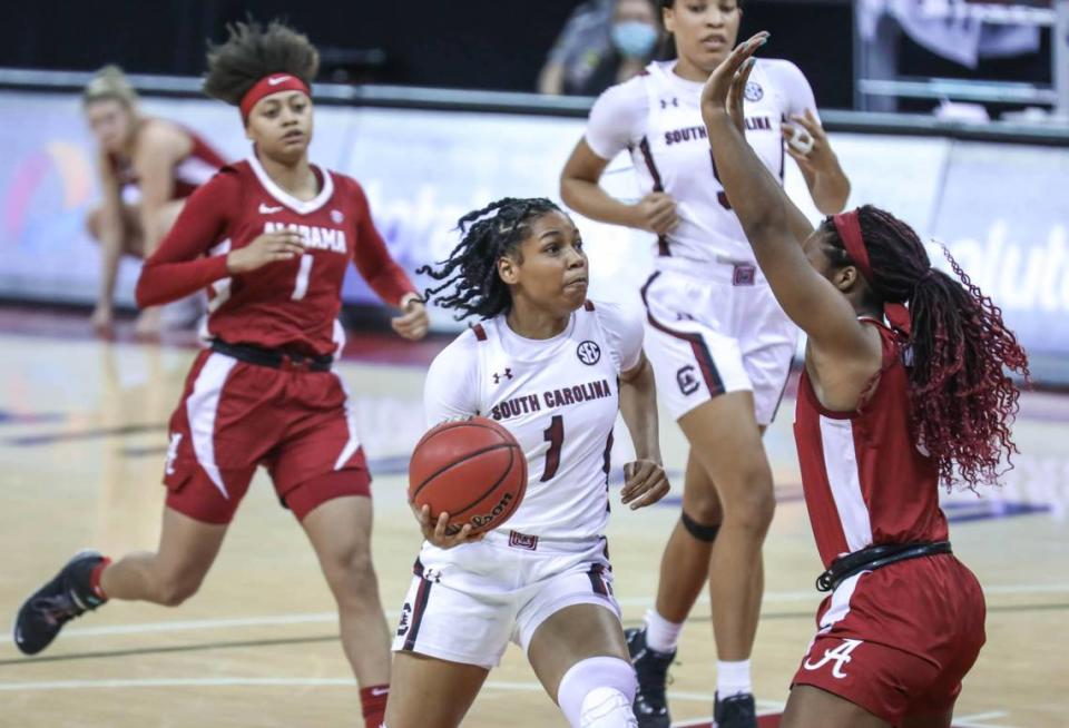 South Carolina Gamecocks guard Zia Cooke (1) drives to the basket as Alabama guard Jordan Lewis (3) pressures during the second half of action at the Colonial Life Arena. The Gamecocks beat Alabama, 87-63.